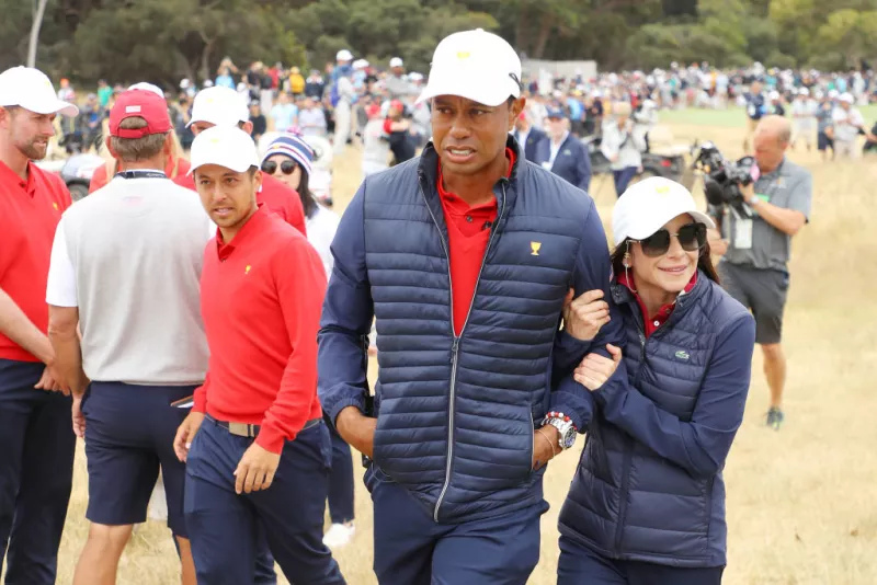 Erica Herman y Tiger Woods