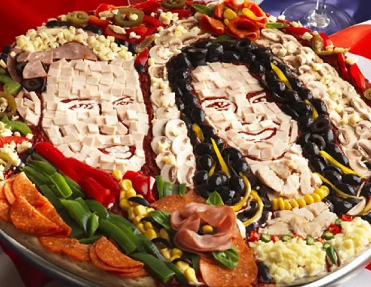 Un artista culinario de Inglaterra, creó una pizza con los rostros del príncipe Guillermo y Kate Middleton.