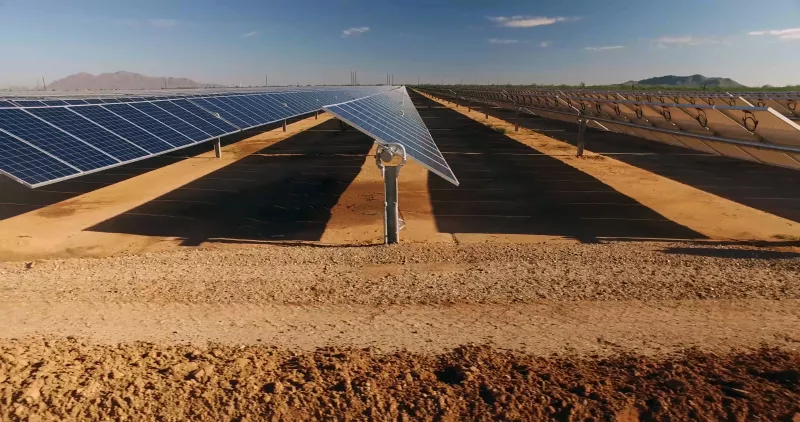 close up of solar power panels in desert