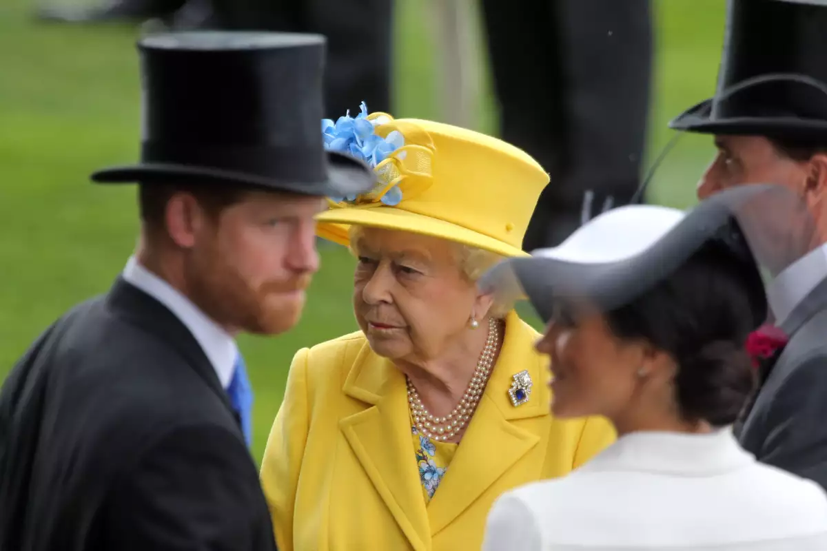 Príncipe Harry, la reina Isabel II y Meghan Markle 