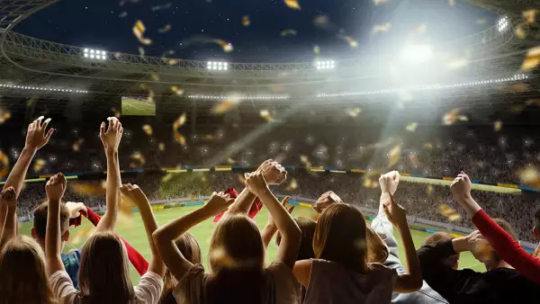 personas en un estadio de futbol