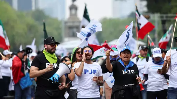 People protest as Mexico's Senate debates a highly contested proposal on a judicial reform, in Mexico City