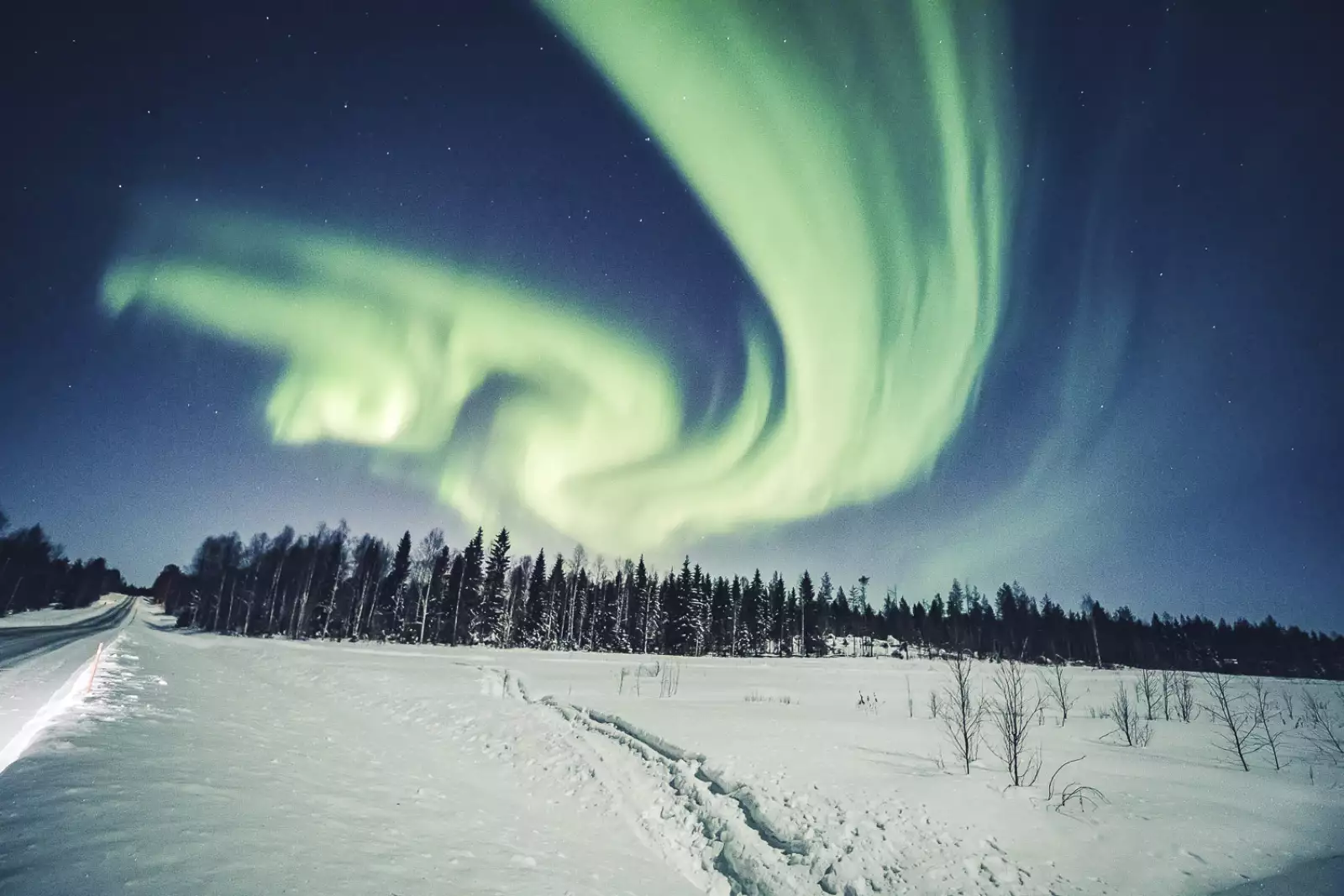 An aurora is seen in the sky in Rovaniemi