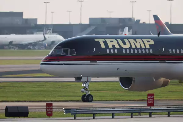 Former U.S. President Donald Trump arrives at Atlanta Hartsfield-Jackson International Airport, in Georgia