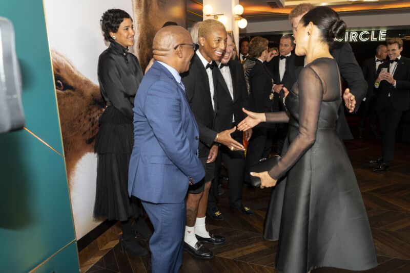 Meghan Markle y Pharrell Williams