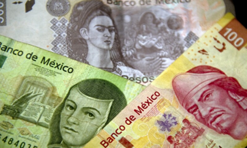 El dólar finalizó en 15.78 pesos en ventanillas. (Foto: AFP )