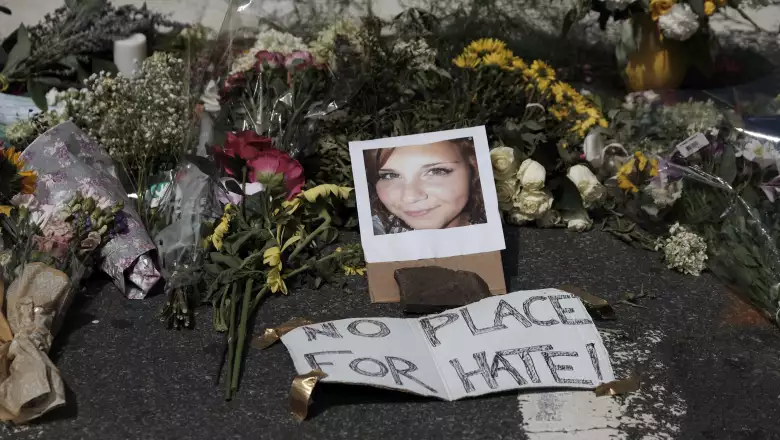 Flowers and a photo of car ramming victim Heather Heyer