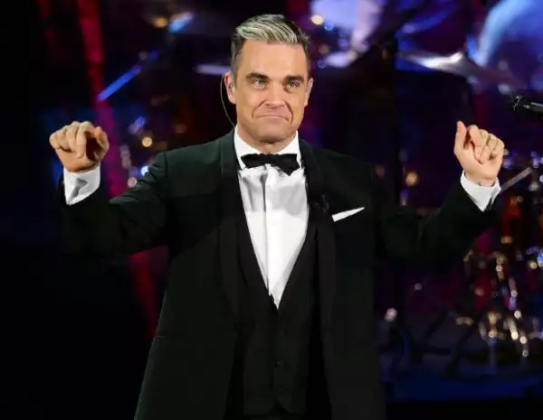 El matrimonio y la paternidad han hecho de Robbie una nueva persona.