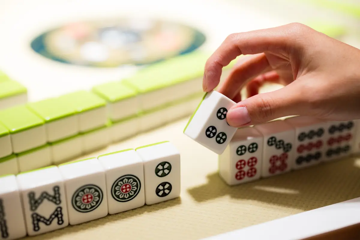 Playing,Mahjong,On,The,Table