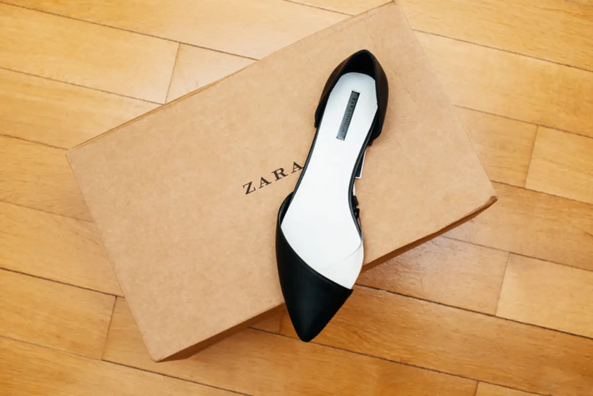 ZARA shoe placed on cardboard box