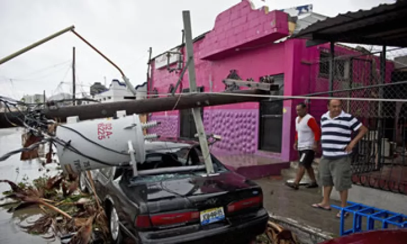 Odile destruyó casas, automóviles, postes de luz, hoteles y otros negocios en Baja California Sur. (Foto: AFP)