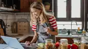 Young woman ordering food ingredients online