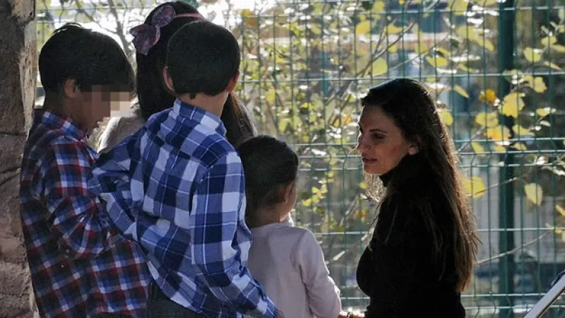 versini con sus hijos