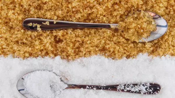 Top view of white and brown sugar