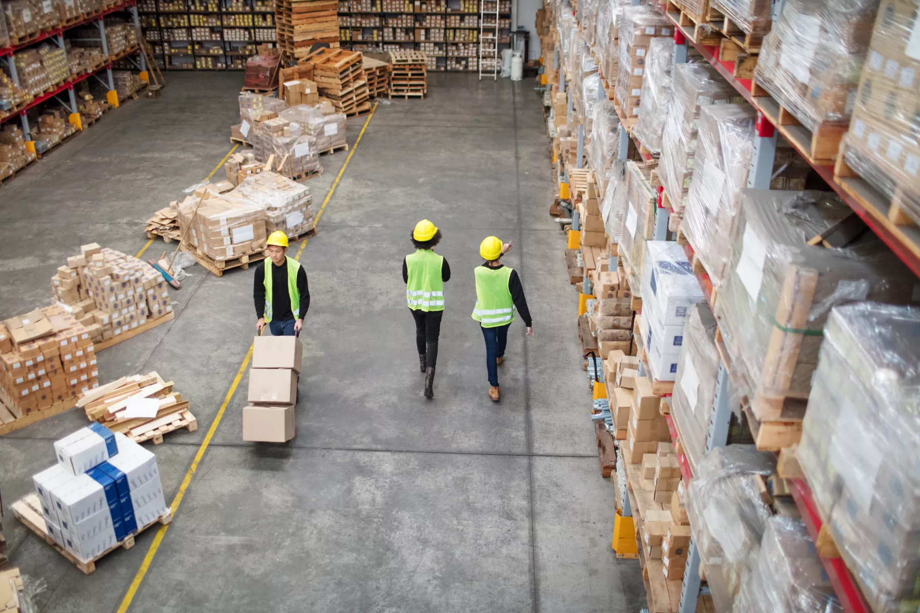 Workers working in large warehouse
