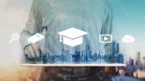 Online education, e-learning and e-book concept. a man using digital tablet for education, with education and online learning media icons