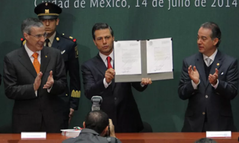 El presidente Enrique Peña Nieto promulgó este lunes las leyes en Palacio Nacional. (Foto: Notimex)