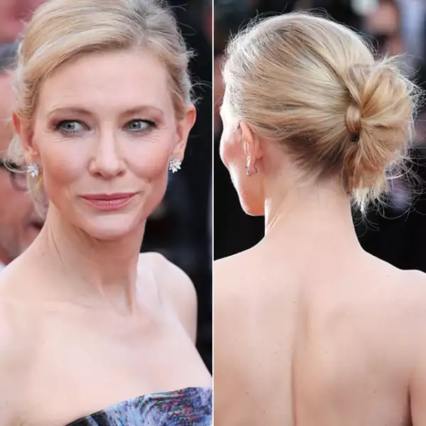 Cate Blanchett también causó sensación en Cannes luciendo un chongo de lado y muy peculiar. Llevó los ojos con sombras claras pero con delineador y los labios en tono naranja nude.