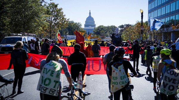 Activists take part in a protest led by shutdownDC the day after the 2020 U.S. presidential election in Washington