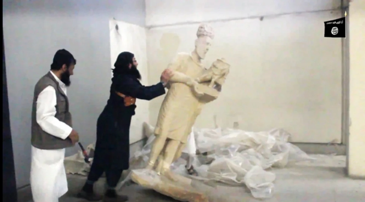 isis rompe esculturas en mosul