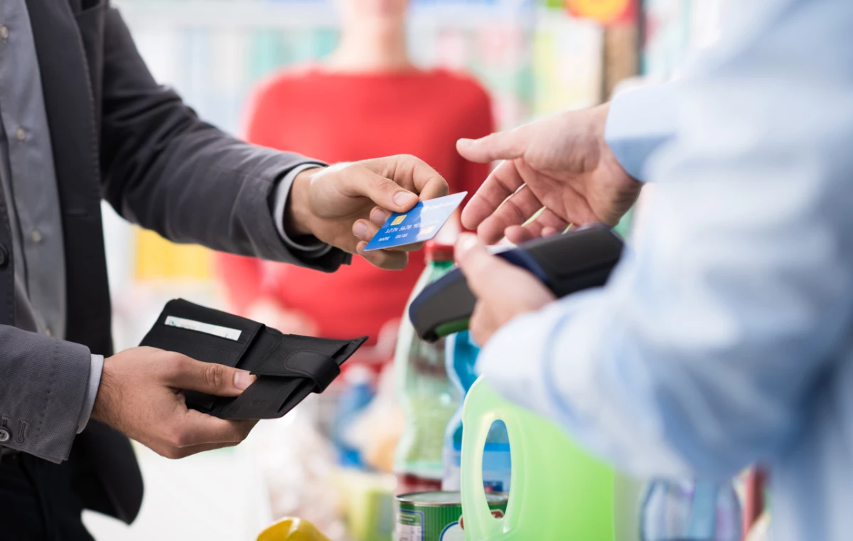 Man paying with his credit card