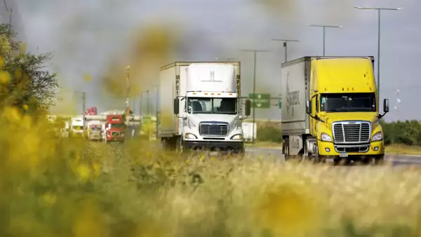 Trucks are seen before arriving at a border customs control to cross into U.S. at the World Trade Bridge in Nuevo Laredo