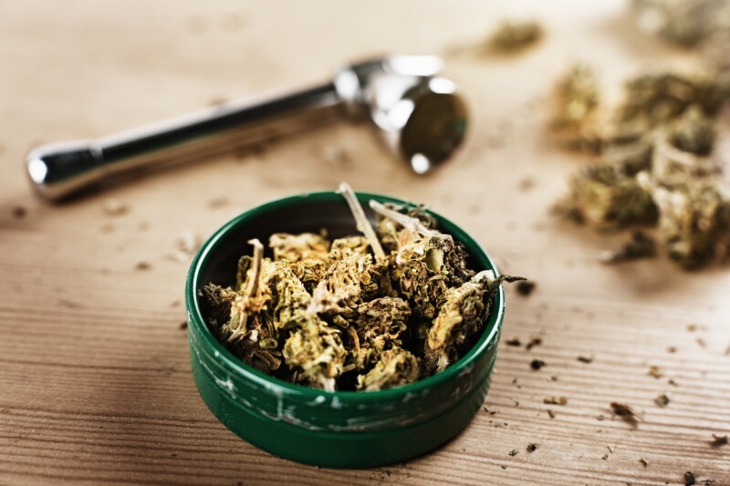 Lid of cannabis with pipe