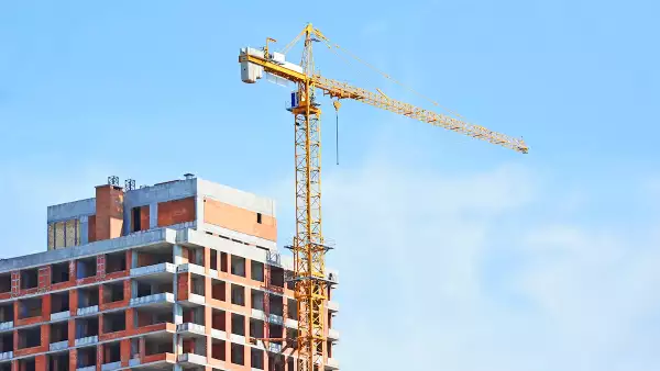 Crane and highrise construction site