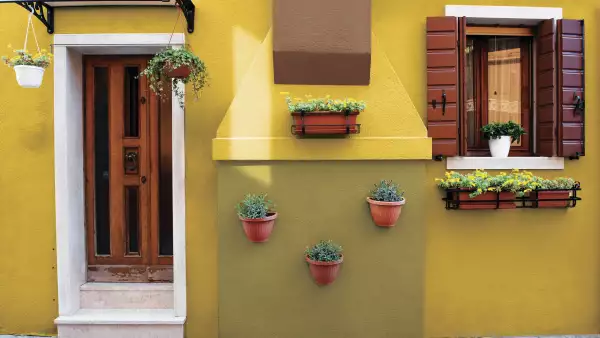Characteristic yellow house in Burano island, Venice, Italy