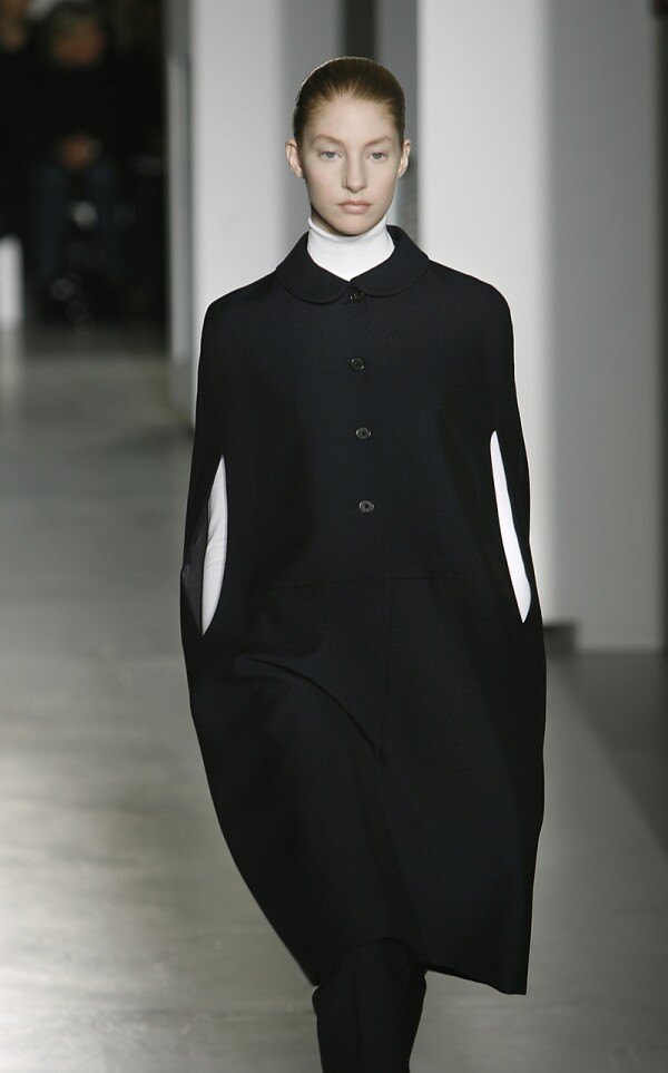 MILAN ? FEBRUARY 20: Models walk down the catwalk during the Jill Sander by Raf Simons' Autumn/Wint