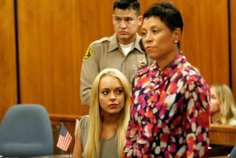 Lindsay Lohan Surrenders