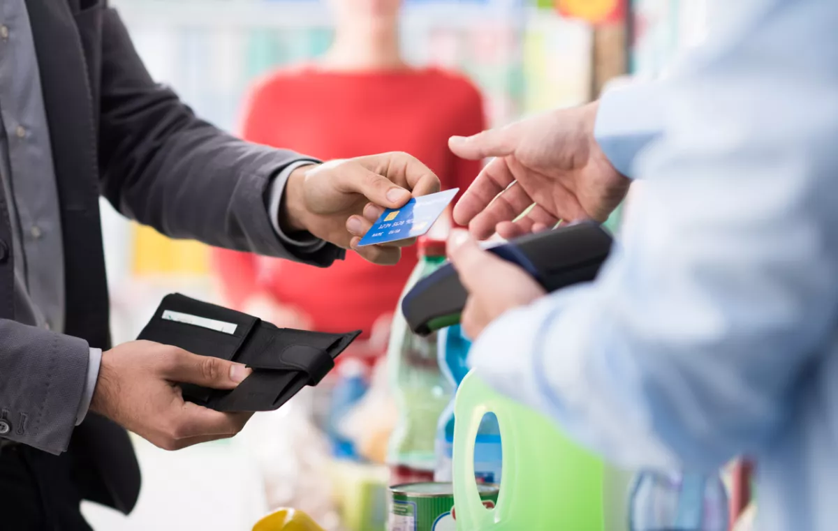 Man paying with his credit card