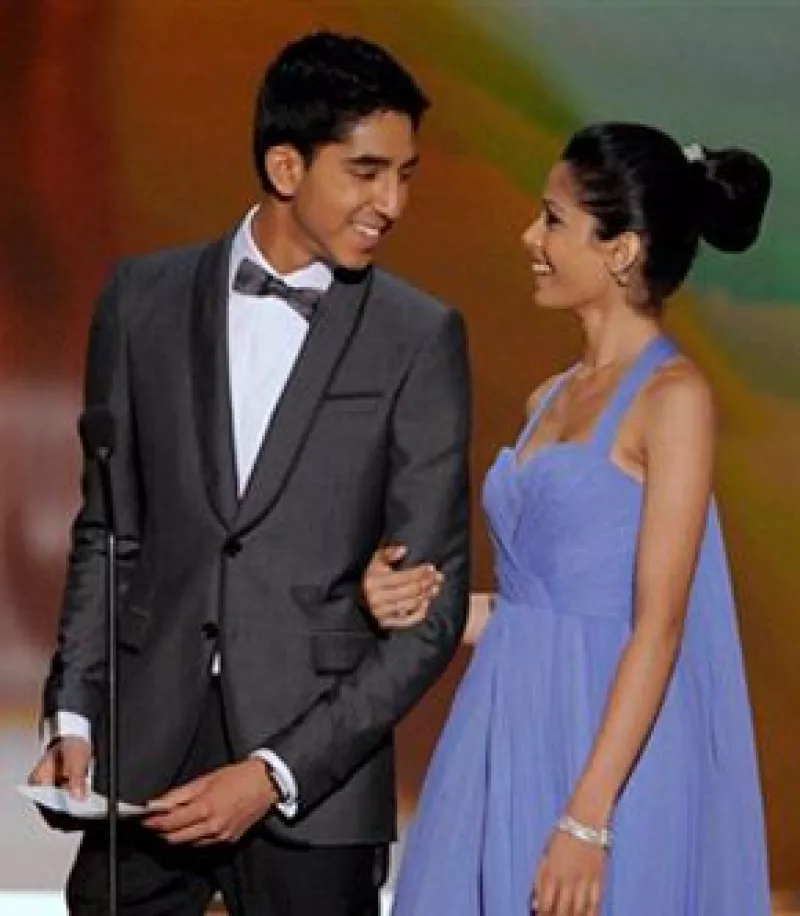 Los protagonistas de la película `Slumdog Millionare´ fueron fotografiados juntos y en actitudes cariñosas en un restaurante de Israel, lugar donde re filma la última película de la actriz.