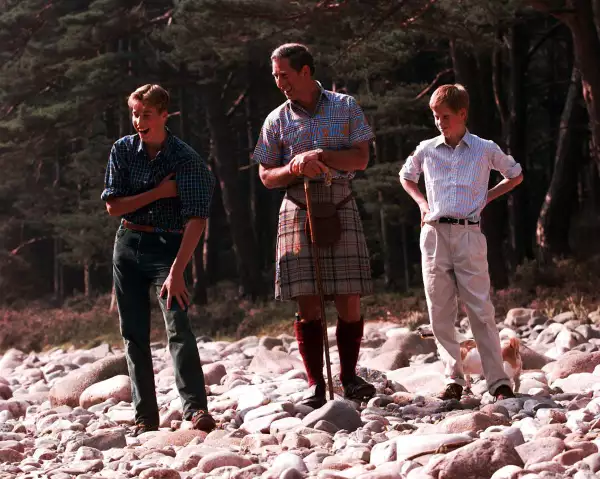 Prince Charles And His Two Sons Prince William And Prince Harry Pictured Walking By The River Dee In Scotland In August 1997. 