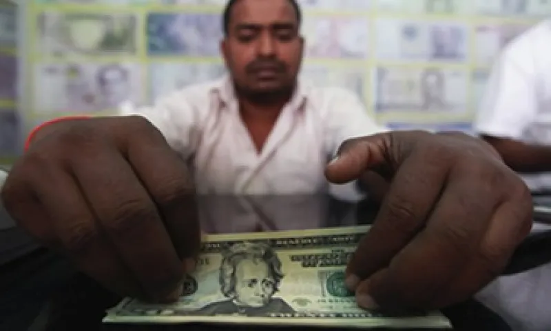 El Banco de México fijó el tipo de cambio en 12.7764 pesos para solventar obligaciones denominadas en moneda extranjera. (Foto: Reuters)