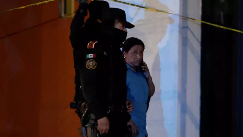 Dolores Bazaldua, mother of 18-year old missing student Debanhi Escobar, leaves the Nueva Castilla motel after authorities found the body of a woman in a water tank, which she says belongs to her daughter, in Escobedo