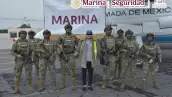En la imagen, Miguel Ángel "N", "El Capitán Sol", junto a marinos tras su detención.