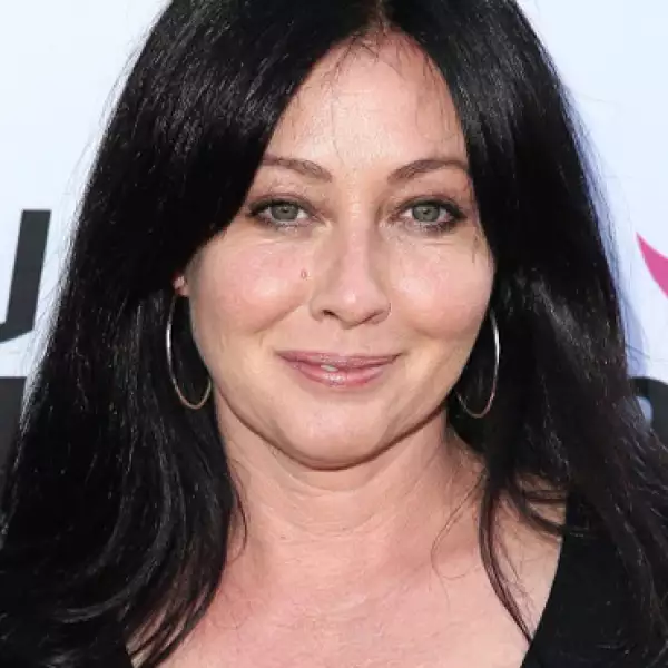 Shannen Doherty era Brenda Walsh.