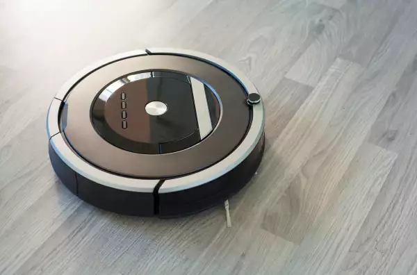 robotic vacuum cleaner on laminate wood floor smart cleaning tec