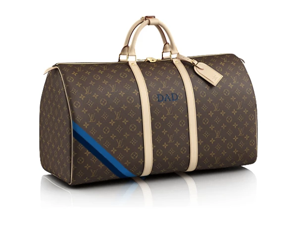 Nada más posh como una maleta con las iniciales de tu papá para sus viajes de negocio.