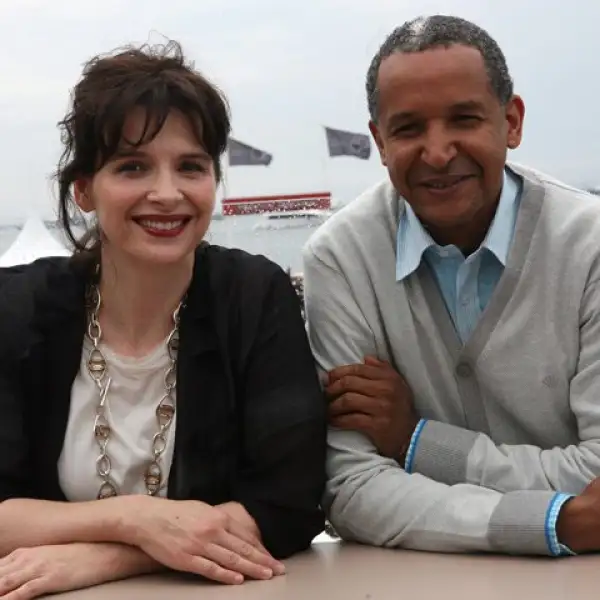 La actriz francesa y el director malí Abderrahmane Sissako decidieron posar juntos en la inauguración del festival en el Film World Pavillon.