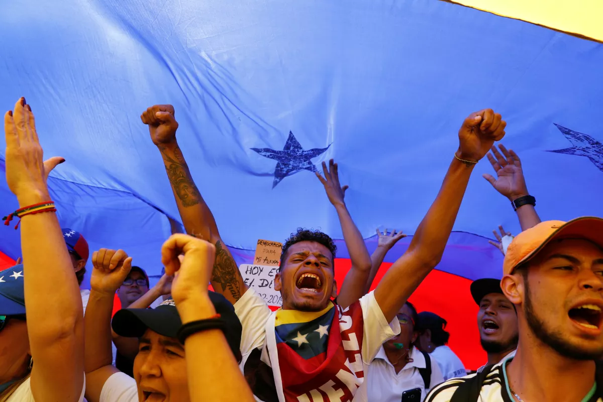 Supporters of the Venezuelan opposition leader Juan Guaido take part in a rally in Caracas