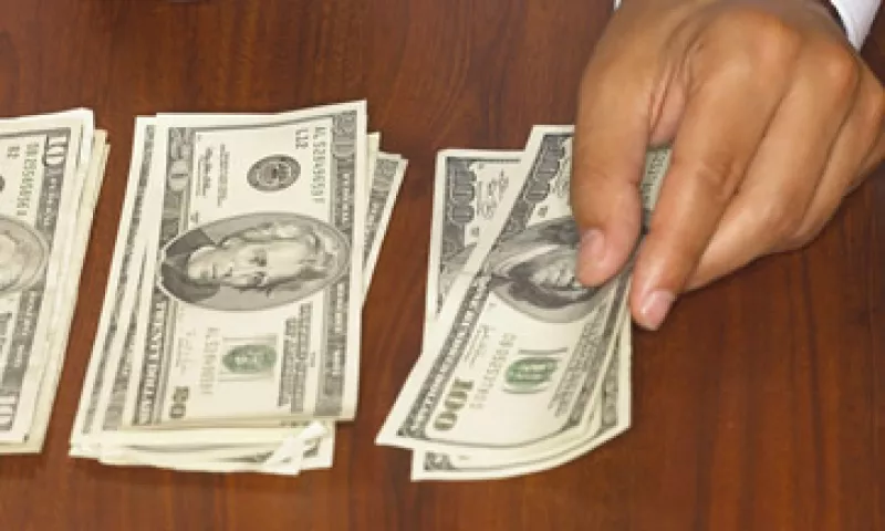 El tipo de cambio es de 13.1474 pesos para solventar obligaciones denominadas en moneda extranjera. (Foto: Thinkstock)