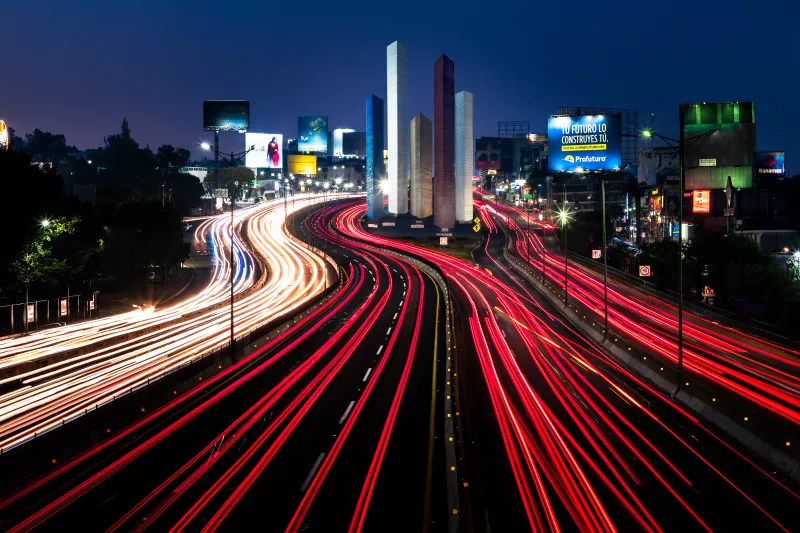 Naucalpan, State of Mexico, Mexico, May 11, 2019 multilane road with car lights in the blue hour