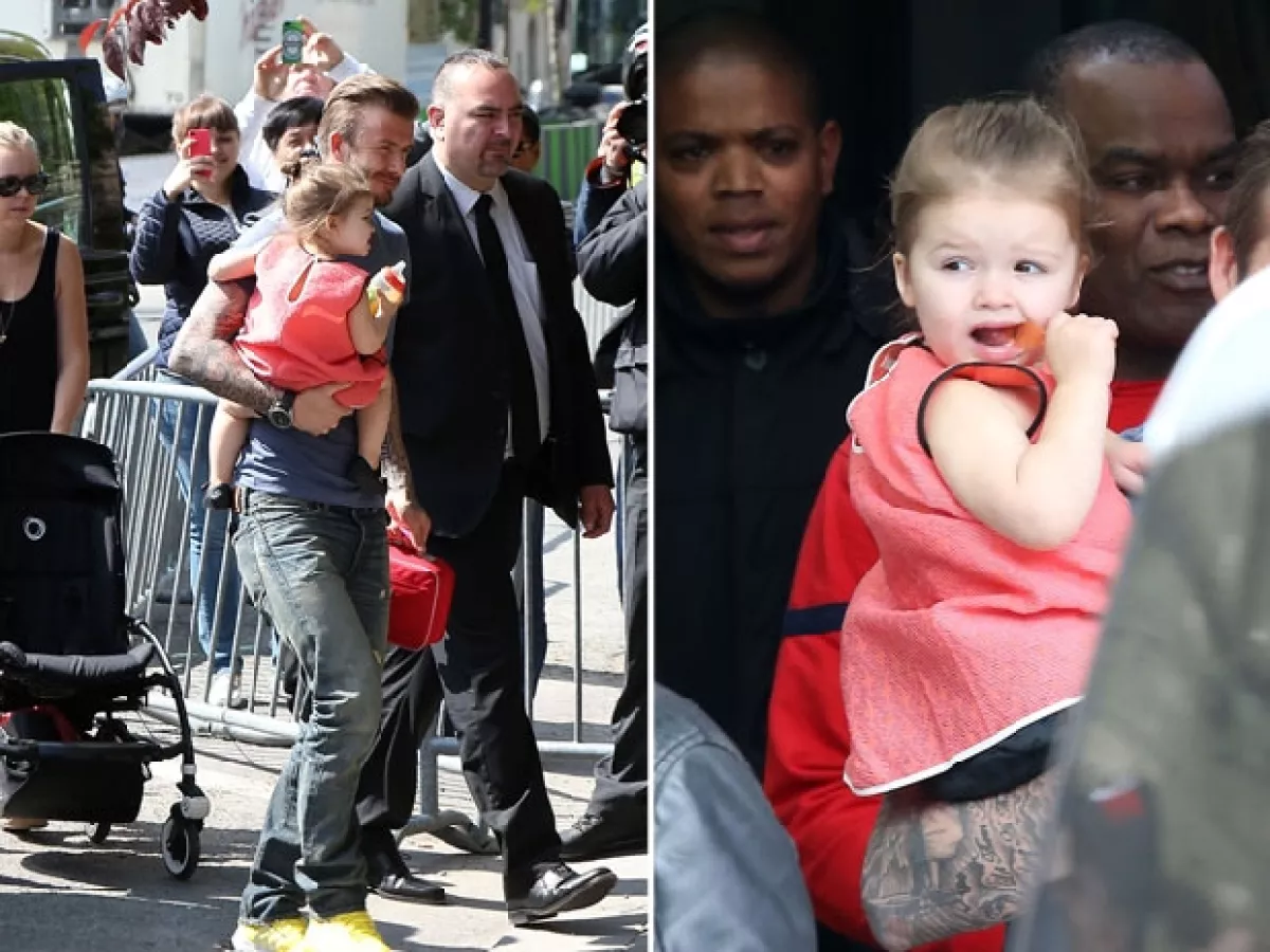 David cargando a la pequeña Harper