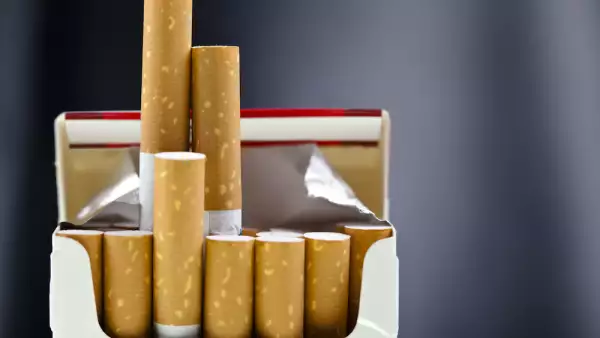 An up close view of a package of several cigarettes