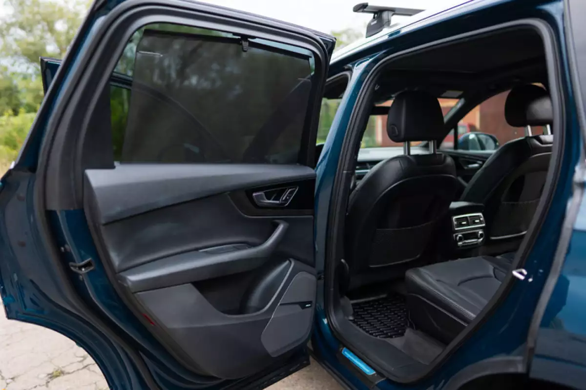 Automobile being opened.