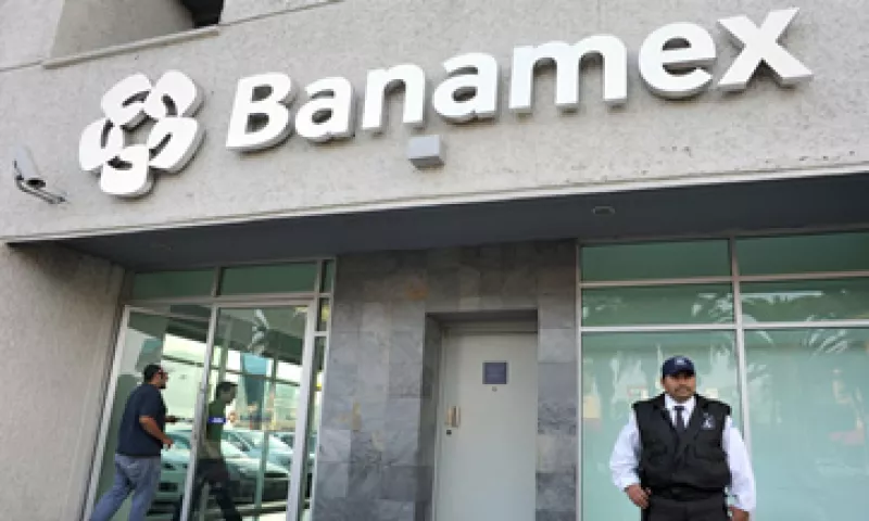 La empresa reportó un aumento de 1.5% en sus ingresos por margen financiero, a 14,958 mdp.  (Foto: Getty Images)