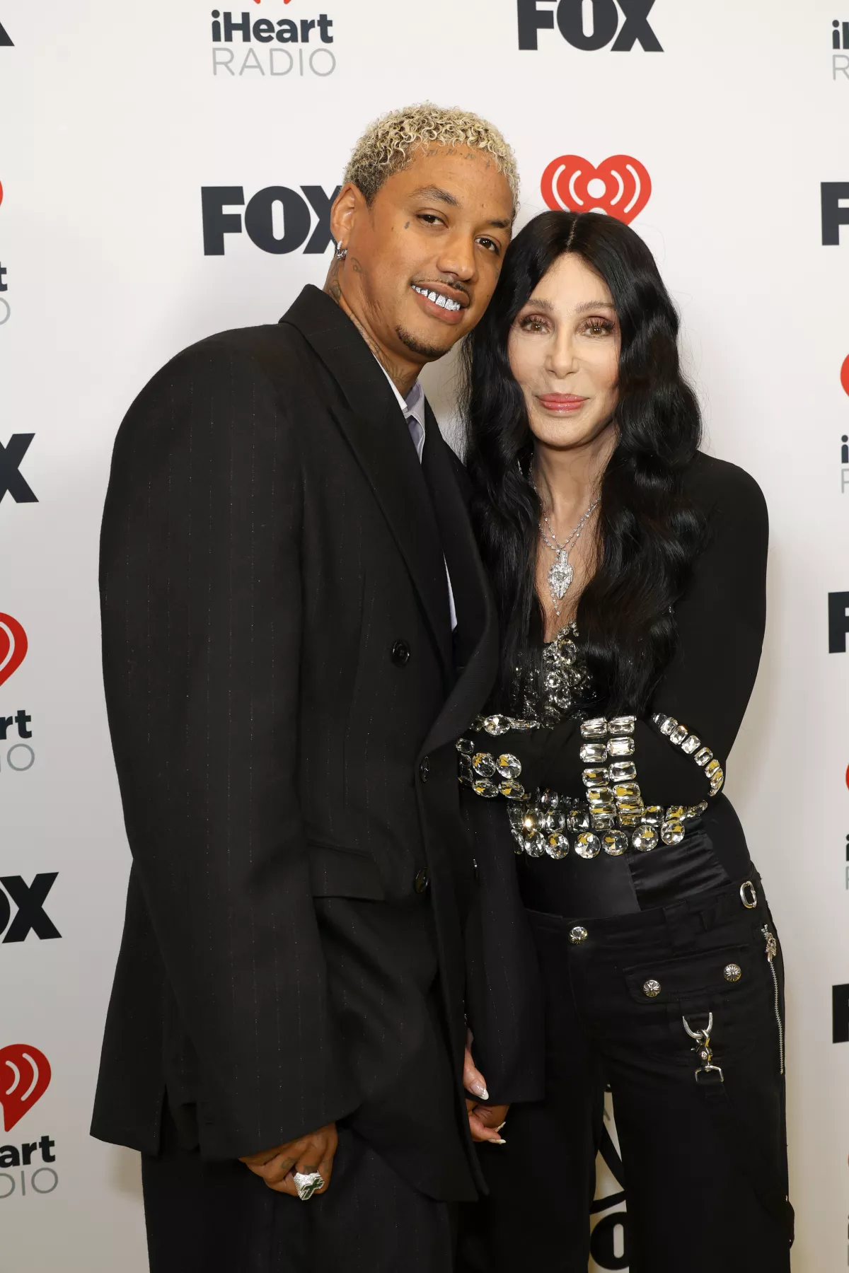 Alexander "AE" Edwards y Cher