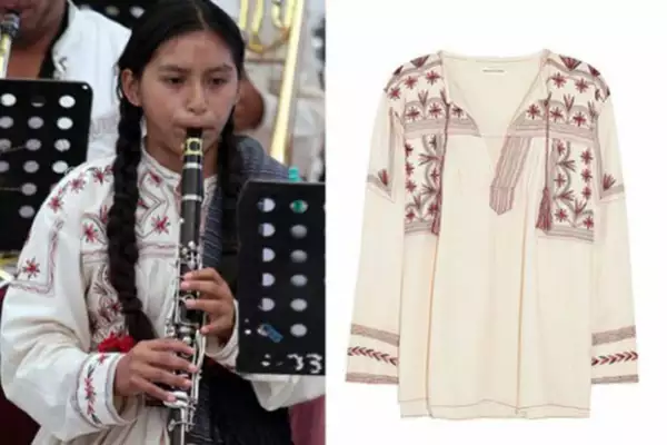 Aquí un miembro de la comunidad mixe usando el bordado tradicional.